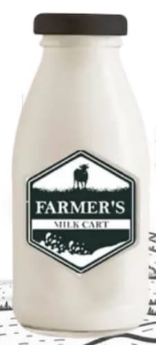 Glass bottle of fresh cow milk
